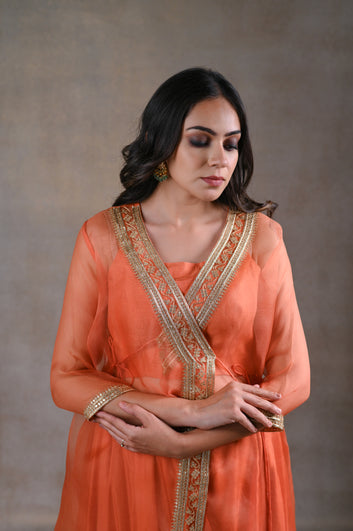 Dainty orange peplum set